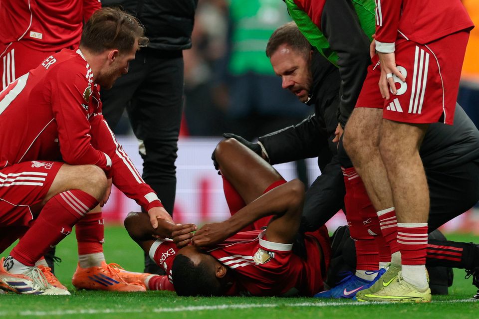 Liverpool's Alexander Isak reacts after sustaining an injury during the Premier League win at Tottenham